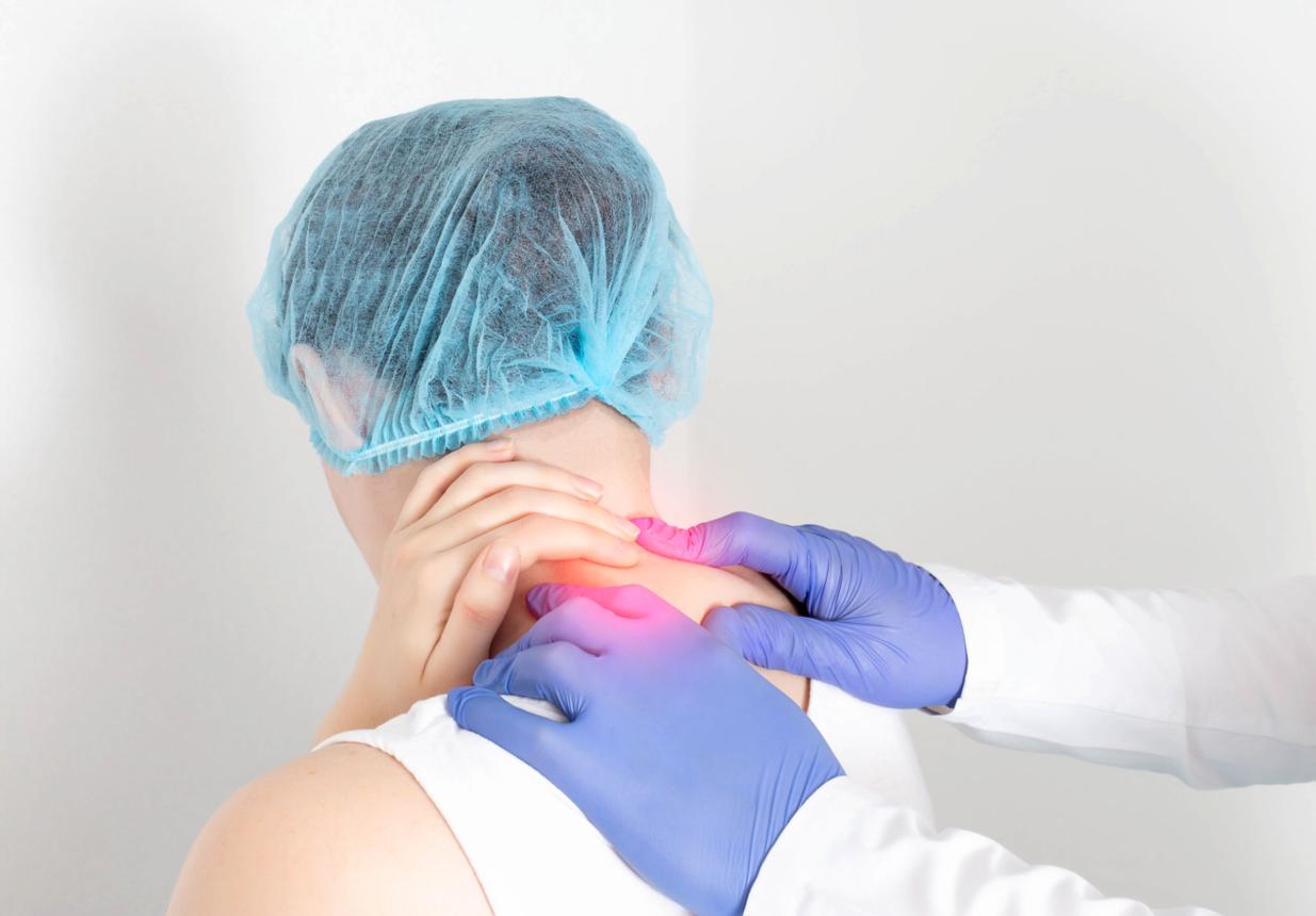 Patient experiencing chronic headaches and neck discomfort